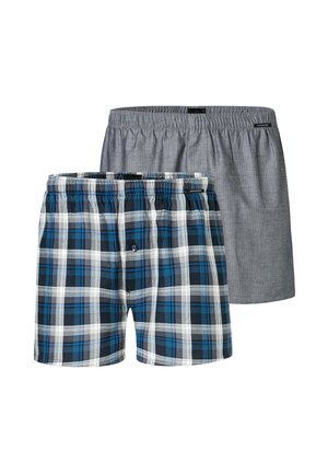 Kockás és világosszürke pamut boxer alsóneműk. Rugalmas derékpánttal, gombos részletekkel a kockás páron, kontrasztos színekkel és puha textúrával rendelkezik.