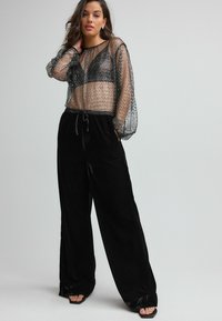 Next WIDE - Pantaloni - black