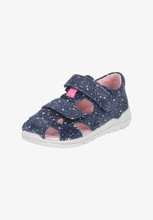 Sandale bleu marine pour enfants avec des taches blanches, deux brides velcro, une doublure intérieure rose et une semelle en caoutchouc blanche.