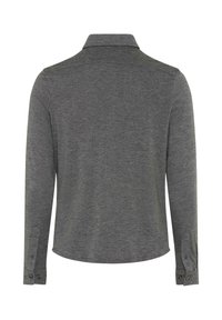 Langärmliges, graues Poloshirt aus strukturiertem Stoff. Mit klassischem Kragen und Knopfmanschetten, sowie einem geraden Saum.