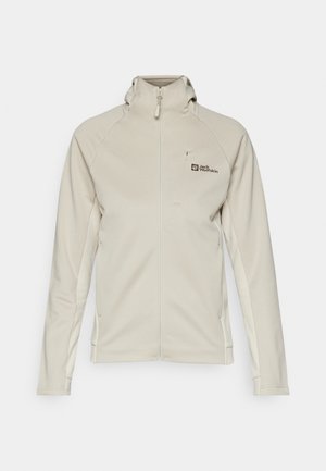 Helle beige Fleecejacke mit Reißverschluss vorne, hohem Kragen und Seitentaschen. Verfügt über ein Logo auf der oberen linken Seite und eine glatte Textur.