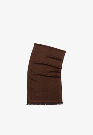 Écharpe marron en tissu texturé présentant un motif circulaire et des bords frangés. Le design est subtil avec une bordure marron plus foncée.