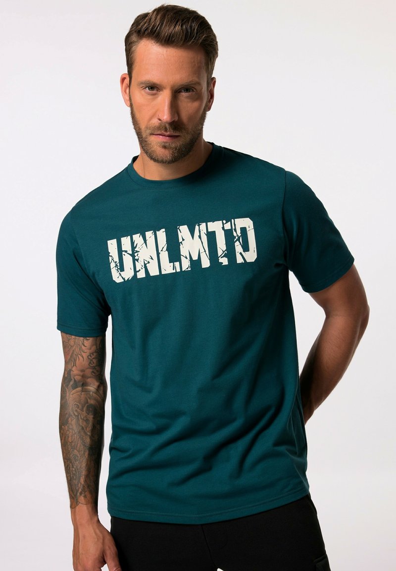 Teal bomulds t-shirt med rund hals, der har et stort hvidt "UNLMTD" grafisk motiv over brystet. Korte ærmer og en afslappet pasform.