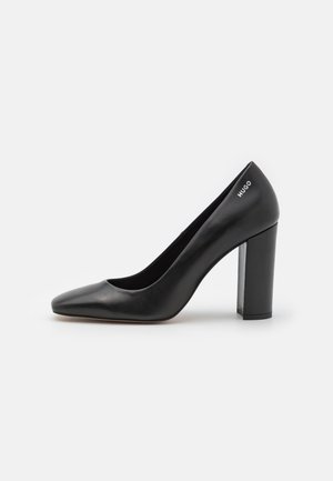 Højhælede pumps - black