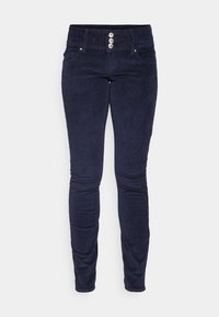 Pantaloni in corduroy blu navy con una silhouette aderente, cinque tasche e vita alta. Presentano tre bottoni argentati come chiusura frontale e una texture a costine.
