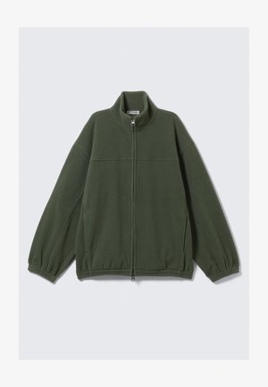 Green fleece jacket with a high collar, full zip, and elasticized cuffs. Features a soft texture and a minimalistic design.