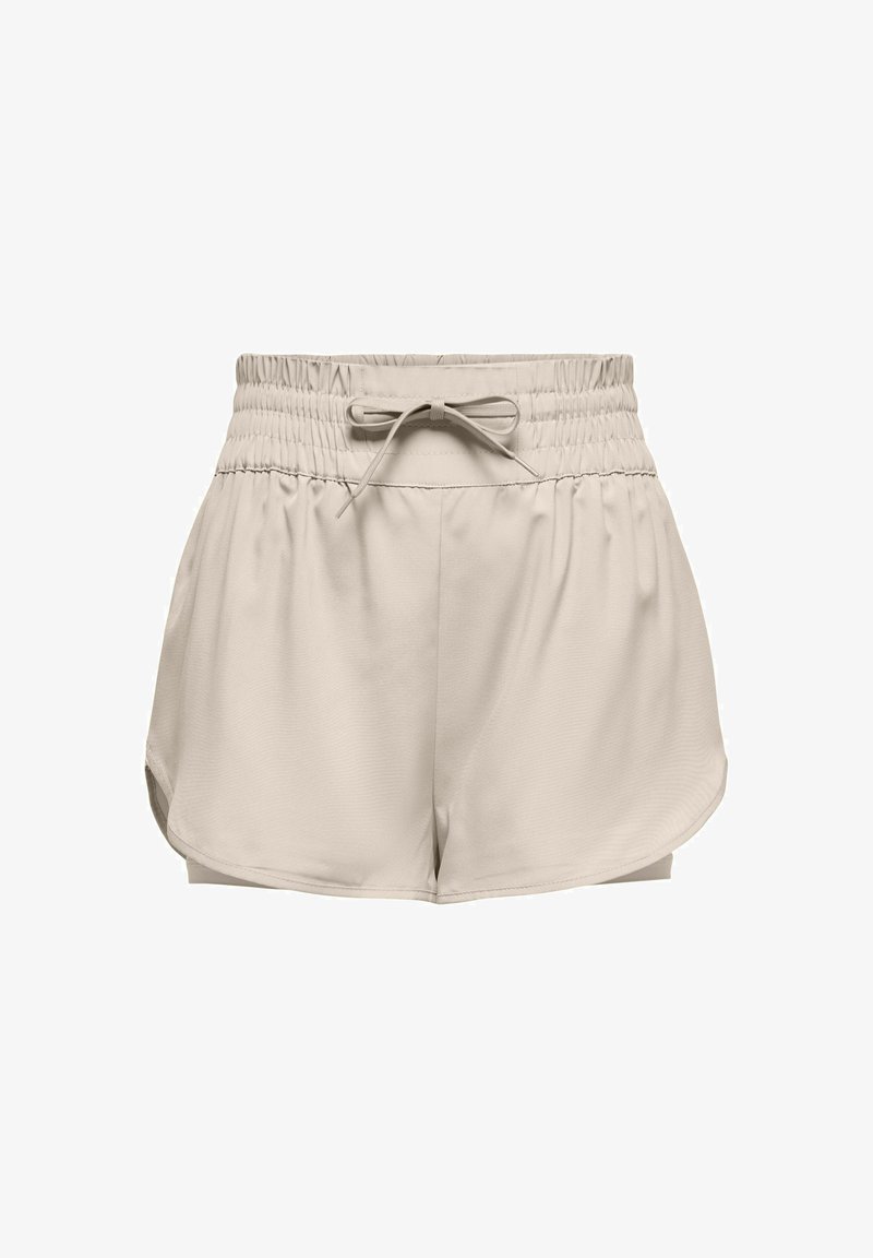 Shorts de sport beiges avec une taille élastique, un cordon de serrage ajustable et des fentes sur les côtés pour un meilleur mouvement. Tissu lisse et léger.