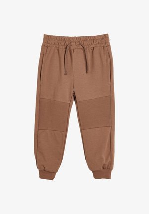 Brązowe spodnie dresowe z elastycznym pasem, sznurkiem, żeberkowymi panelami na kolanach, bocznymi kieszeniami i elastycznymi mankietami u kostek.