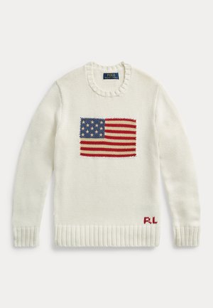Fehér kötött pulóver hosszú ujjal. Az elején piros, fehér és kék hímzett amerikai zászló található, valamint bordázott alsó szegély.