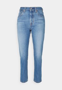 Light blue denim jeans with a high waist, straight fit, and cropped leg. Features five pockets and subtle fading in the fabric.