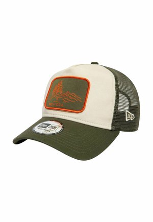 Two-tone green and beige mesh baseball cap with adjustable strap, featuring an orange-outlined patch of mountains and trees on front panel.