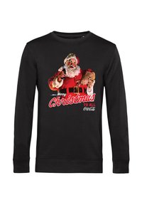 Felpa nera con una grafica vintage di Babbo Natale che tiene una bottiglia e testo che dice "Buon Natale a tutti Coca-Cola."