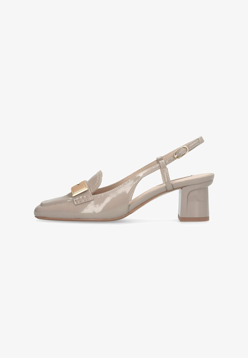 Beige patent leather slingback shoe with block heel and gold buckle detail on the front.