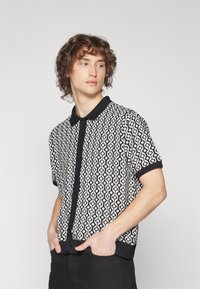 Obey Clothing TESTAMENT BUTTON FRONT POLO UNISEX - Blusa - black multi