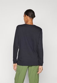 Columbia NORTH CASCADES™ TEE - Top dugih rukava - black