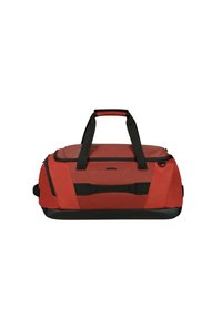 Red duffel bag with black accents. Features sturdy handles, a zippered opening, and a textured surface. Expandable side pocket included.