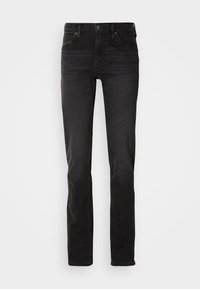 Mustad teksased slim fit lõikega, klassikalise viie taskuga disain, vöökohad ja sirge jalg. Sile tekstuur minimaalsete plekkidega.