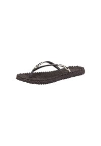 Schwarze gewebte Flip-Flops mit einem schwarzen Riemen und einem weißen Riemen mit schwarzen und braunen Leopardenflecken.