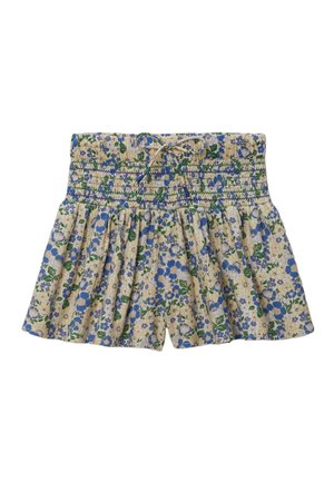 Shorts fleuris avec taille smockée, arborant un motif bleu et vert sur un fond beige. Tissu léger avec une coupe décontractée.