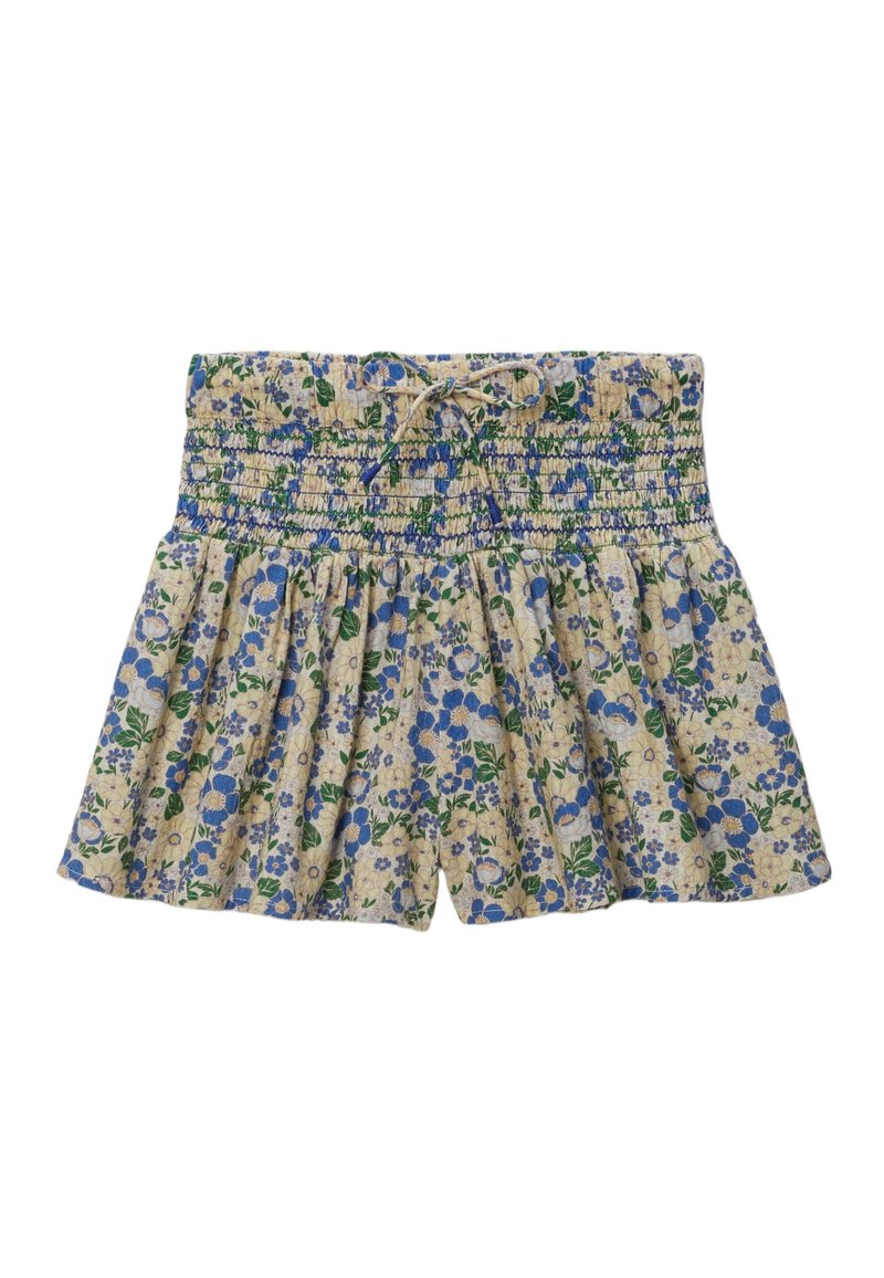Shorts fleuris avec taille smockée, arborant un motif bleu et vert sur un fond beige. Tissu léger avec une coupe décontractée.