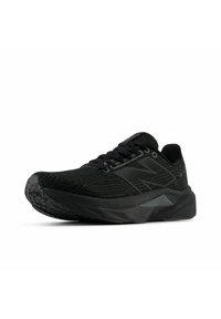 Black athletic shoe with textured fabric upper, patterned design, cushioned sole, and a sleek silhouette. Features lace closure and logo accent.