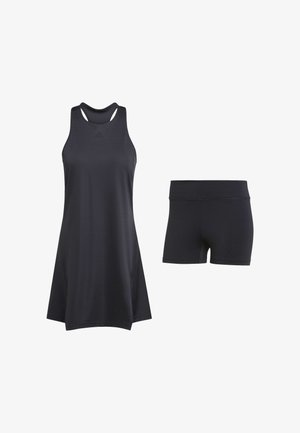 Svart sportset bestående av ett ärmlöst linne med racerback-design och matchande midjelånga shorts. Tillverkade av lätt, mjukt tyg.