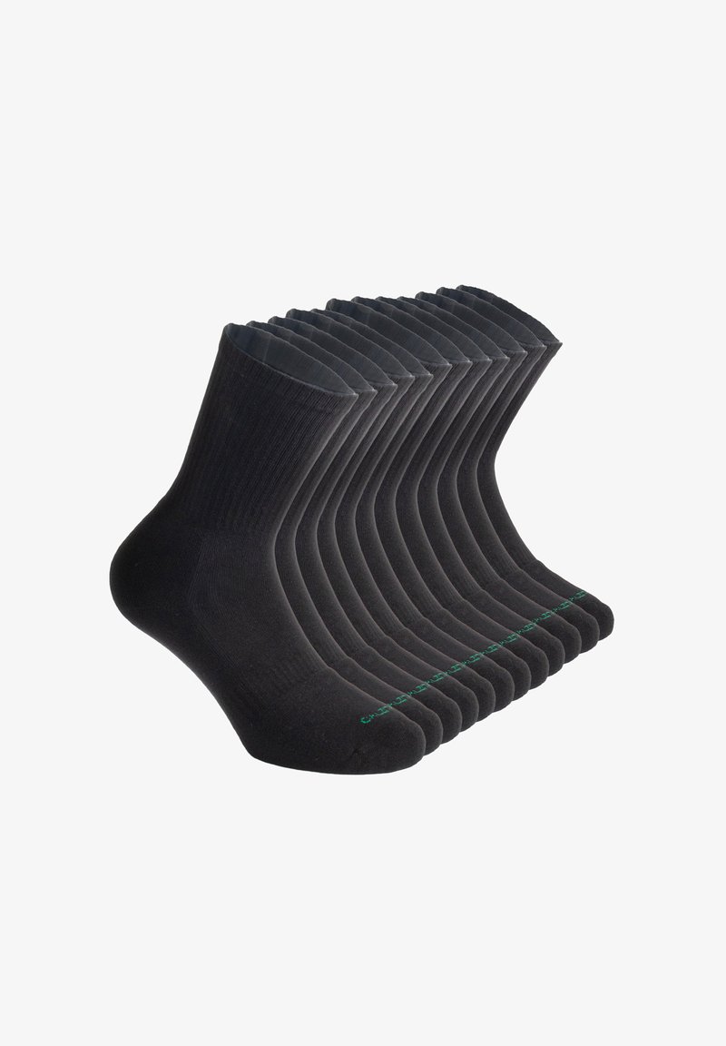 Calcetines de algodón negros dispuestos en fila, con textura acanalada, punta reforzada y un acento verde en las suelas.