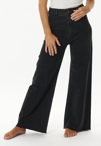 HOLIDAY - Wide leg - washed black