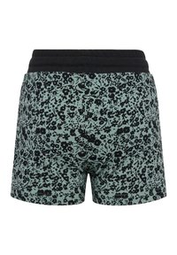 Blommönstrade shorts i mintgrön med svarta blommor, med ett svart elastiskt midjeband och ett mjukt, texturerat tyger.