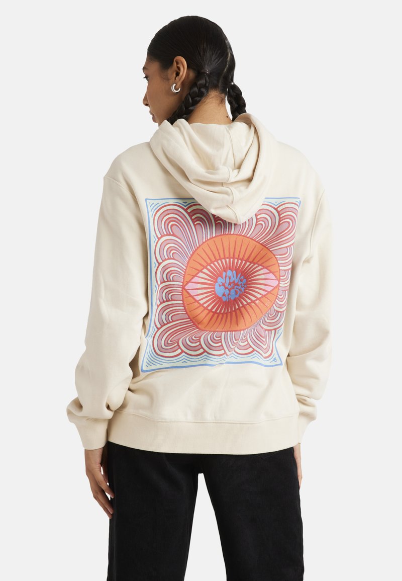Beige hoodie featuring a large multicolored graphic on the back with swirling patterns and an eye design. Textured cotton material.