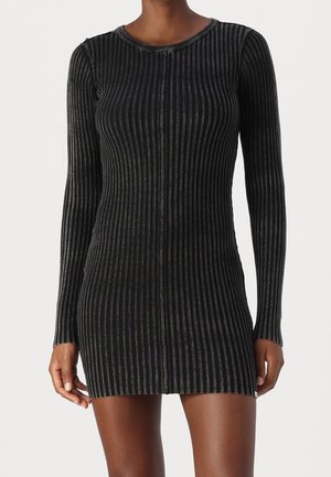 Black ribbed knit dress with long sleeves and round neckline, fitted silhouette, and short hemline.