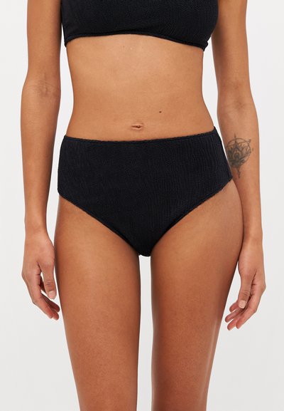 Schwarze High-Waist-Bikinis mit strukturiertem Stoff, in einfarbigem Design und elastischem Bund für einen sicheren Sitz. Keine sichtbaren Hardware-Akzente.