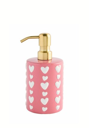 Pink cylindrical soap dispenser with white heart patterns and a gold pump top.