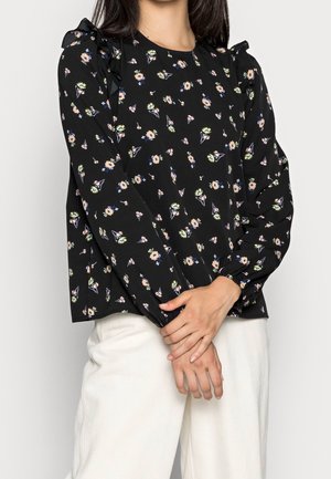 Schwarze Bluse mit floralem Druck, mit Rüschensleeves und rundem Ausschnitt. Hergestellt aus leichtem Stoff, mit einem lockeren, entspannten Schnitt.