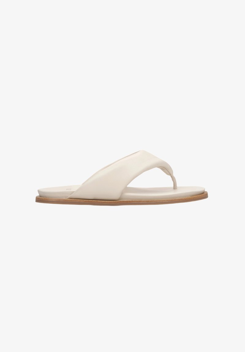 Beige flip-flop sandal with a smooth, glossy upper and minimalistic design. Flat sole with brown edging and a thong strap for toe grip.