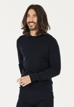 Donkerblauwe long-sleeve shirt van zachte stof, met een ronde hals en aansluitende mouwen, voorzien van een subtiele textuur.