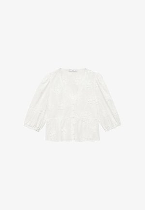 Bluza albă brodată cu flori, cu decolteu în V, mâneci bufante cu lungimea de trei sferturi și tiv peplum. Prezintă închidere cu butoane în față.