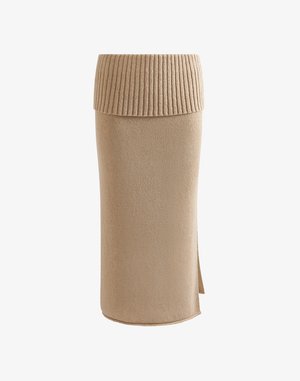 Beige knit skirt with a ribbed waistband, straight silhouette, and a side slit. Soft texture and seamless construction.
