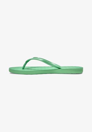 Sandale tongs en caoutchouc vert avec semelle texturée et bride en forme de Y, vue de profil sur fond blanc.