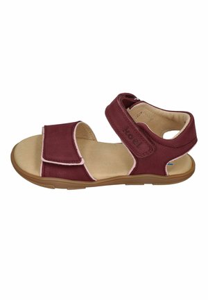 Kindergröße Sandale in Kastanienbraun mit beige gepolsterter Sohle, verstellbaren Klettverschlüssen über den Zehen und um den Knöchel sowie weicher Innenausstattung.