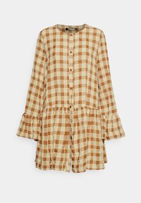 Vestido de botão, de mangas longas, em tecido xadrez castanho e creme. Punhos franzidos e uma bainha ampla acrescentam volume e detalhe.