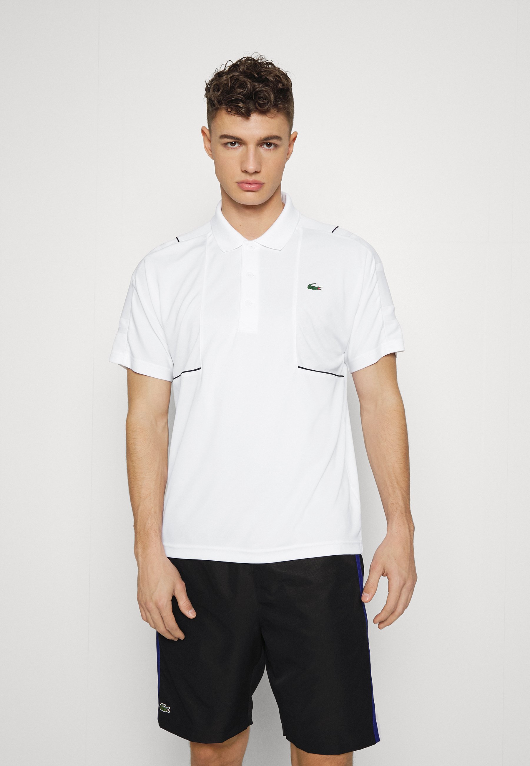 Lacoste – Pantaloncini Tennis SPORT color block Uomo Pantaloncini  White/Mexico Red-Navy Blu | BIEMMESHOP