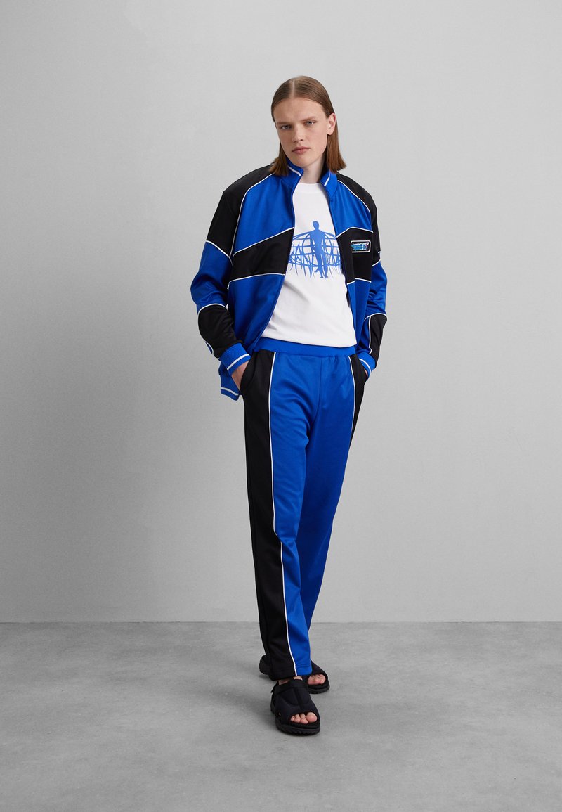 Alexandra Moura DUALITY TROUSERS - Donji dijelovi trenirke - sports blue