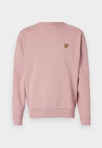 Lichtroze sweatshirt met lange mouwen, ribgebreide halslijn en manchetten. Voorzien van een klein geborduurd geel logo op de linker borst.
