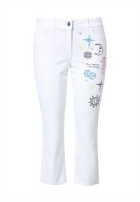 Valkoiset denim capri-housut, joissa on erilaisia värikkäitä brodeerattuja kuvioita, kuten tähtiä, silmiä, perhosia ja tekstikoristeita.