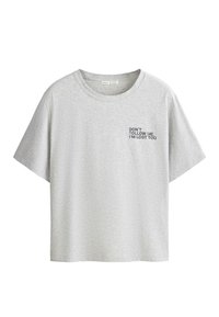 T-shirt gris clair à manches courtes avec col rond, avec un texte noir sur la poitrine gauche disant « NE ME SUIVEZ PAS, JE SUIS AUSSI PERDU. »