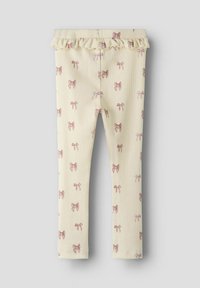 Jasnożółte legginsy o prążkowanej teksturze, zdobione rozrzuconym wzorem różowych kokardek i falbaniastym detalem w pasie.