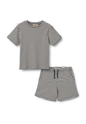T-shirt à manches courtes et short assorti avec des rayures horizontales noires et blanches, taille élastique avec cordon de serrage sur le short.