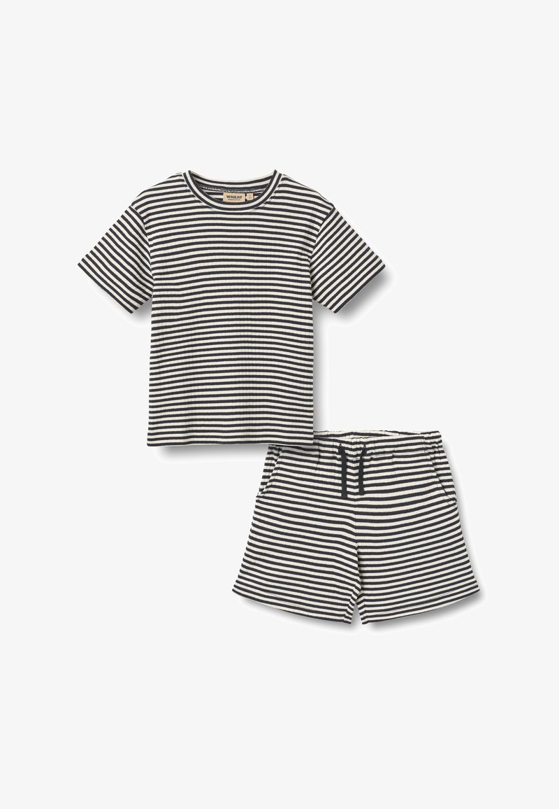 T-shirt à manches courtes et short assorti avec des rayures horizontales noires et blanches, taille élastique avec cordon de serrage sur le short.