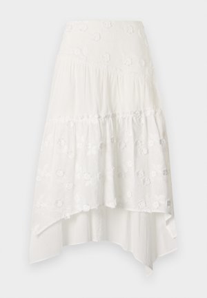 Jupe blanche à volants avec broderie florale. Dotée d'une taille ajustée et d'un tissu fluide en couches, créant un ourlet asymétrique.